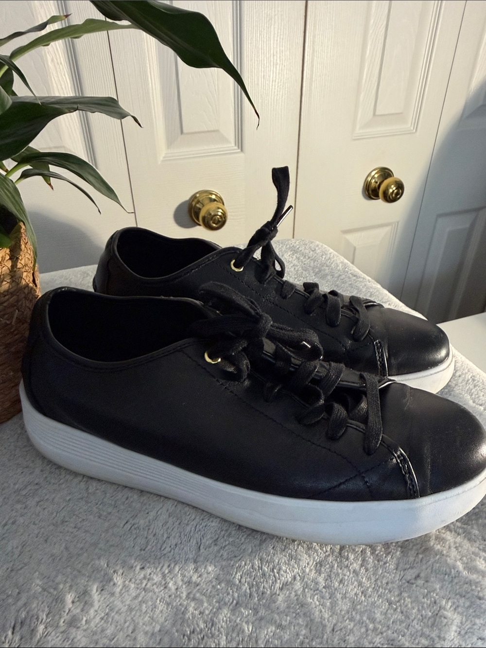 Women’s Cole Haan Black Leather Low-Top Sneakers with White Platform Sole